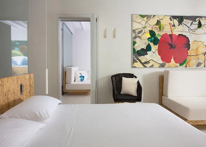 מלון Mykonos Dove Beachfront 5*